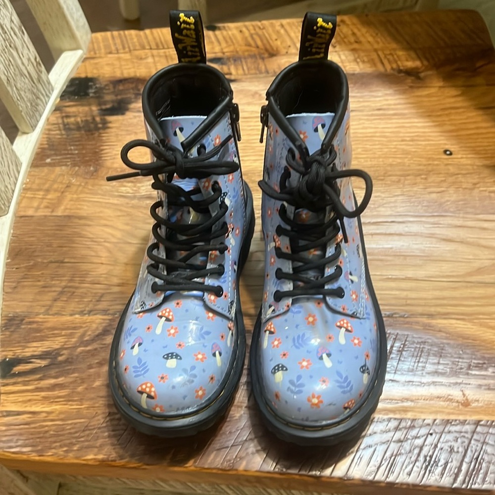 Kids size US 1 mushroom themed Dr Martens boots.